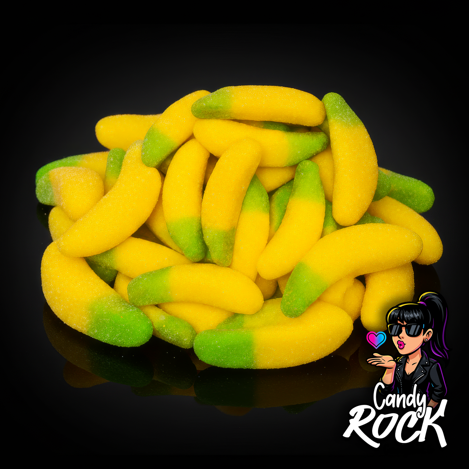 Vue rapprochée de bananes gélifiées fourrées bicolores, détail du sucre et du cœur fondant, CandyRock.