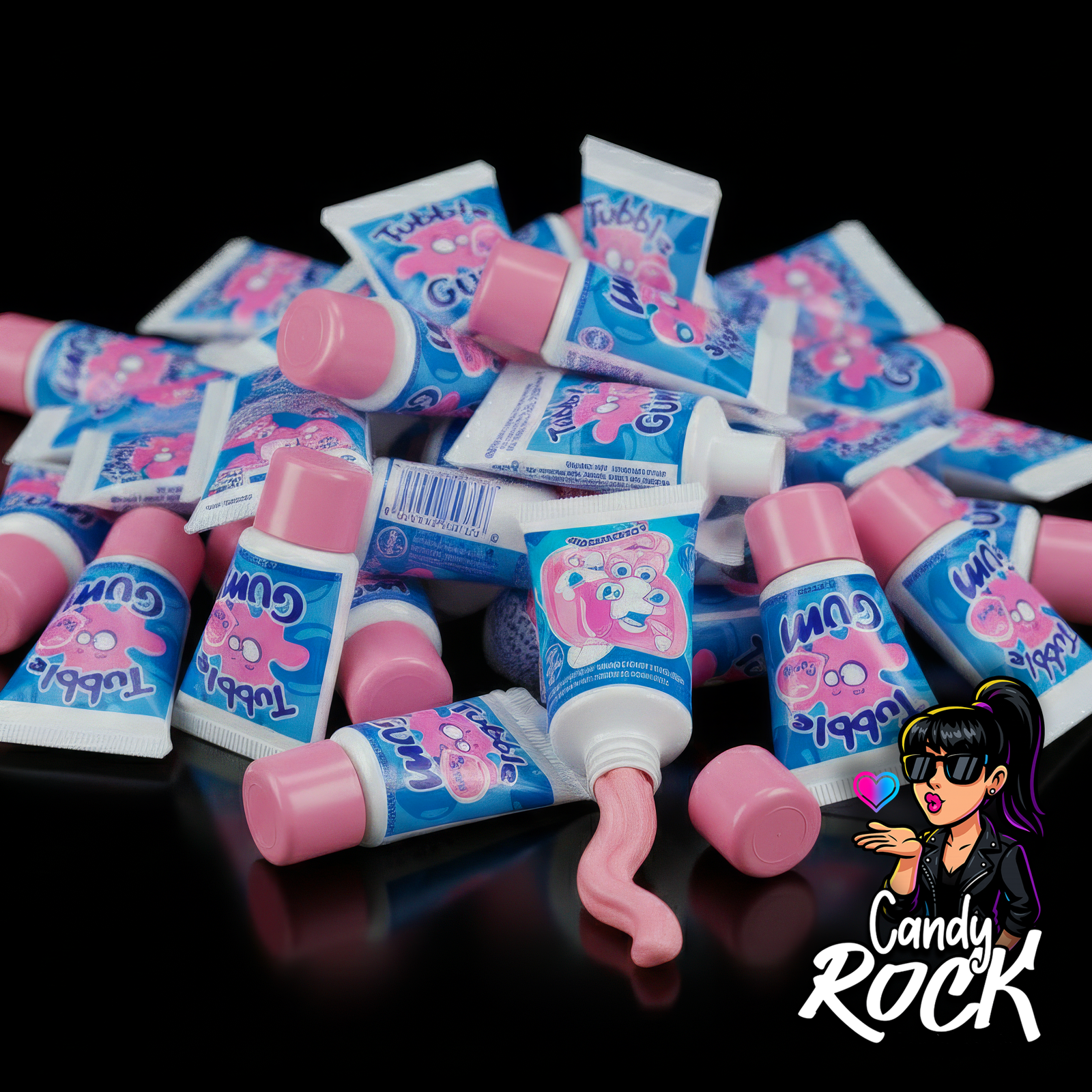 Tubes de chewing-gum Tutti Frutti Lutti, pâte rose sortant du tube sur fond noir CandyRock.
