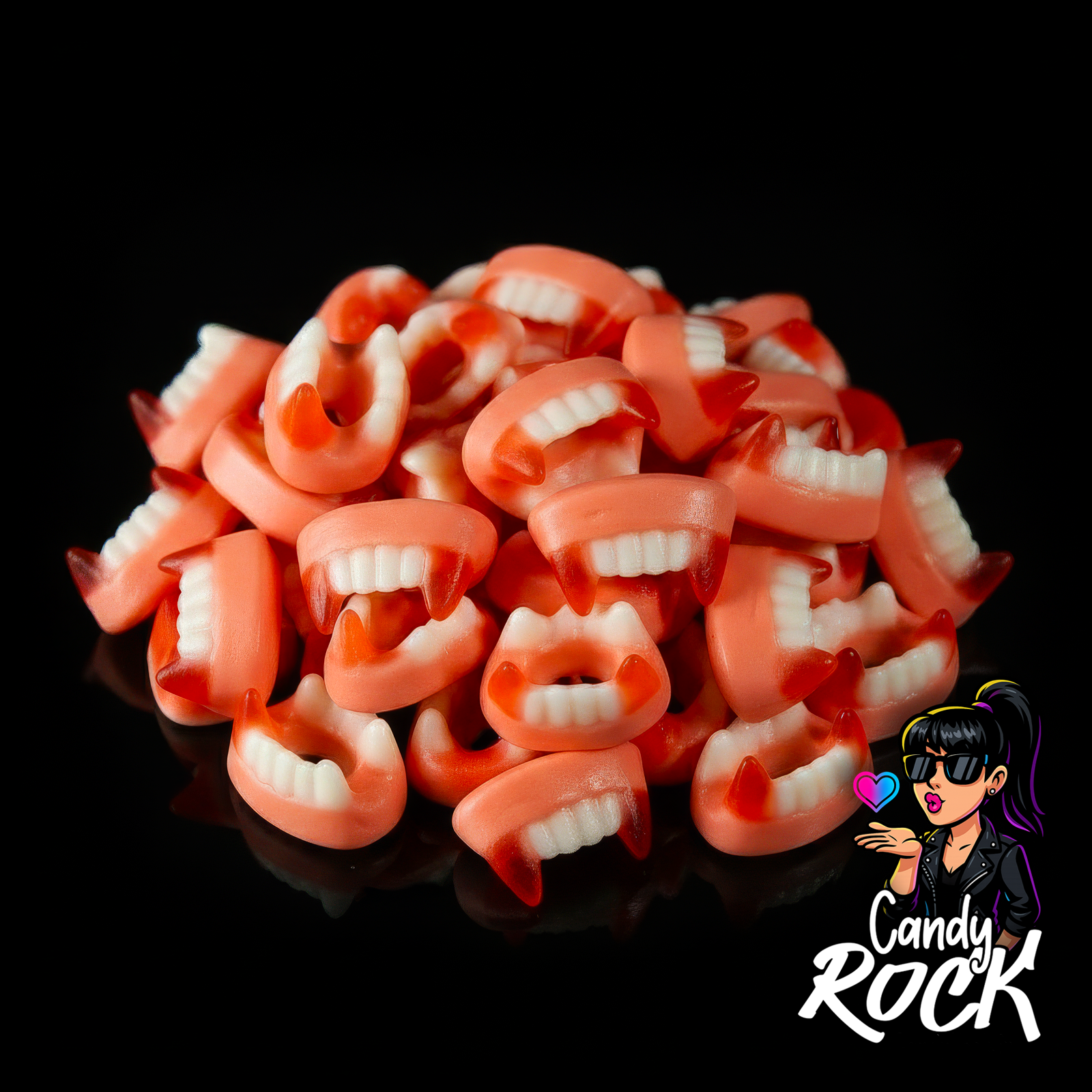 Dentures gélifiées lisses rose blanc et rouge, texture brillante en tas sur fond noir CandyRock.