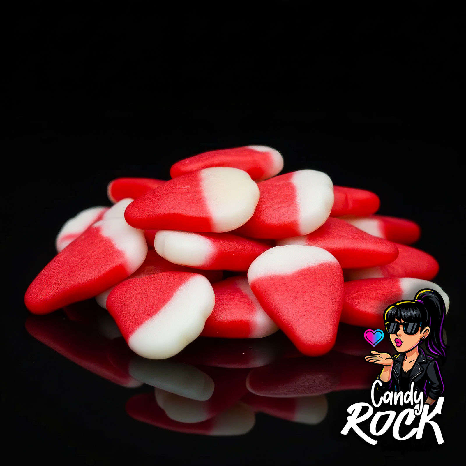 Zoom sur les bonbons fraise crème Dulceplus, texture lisse bicolore rouge et blanc, ambiance CandyRock.