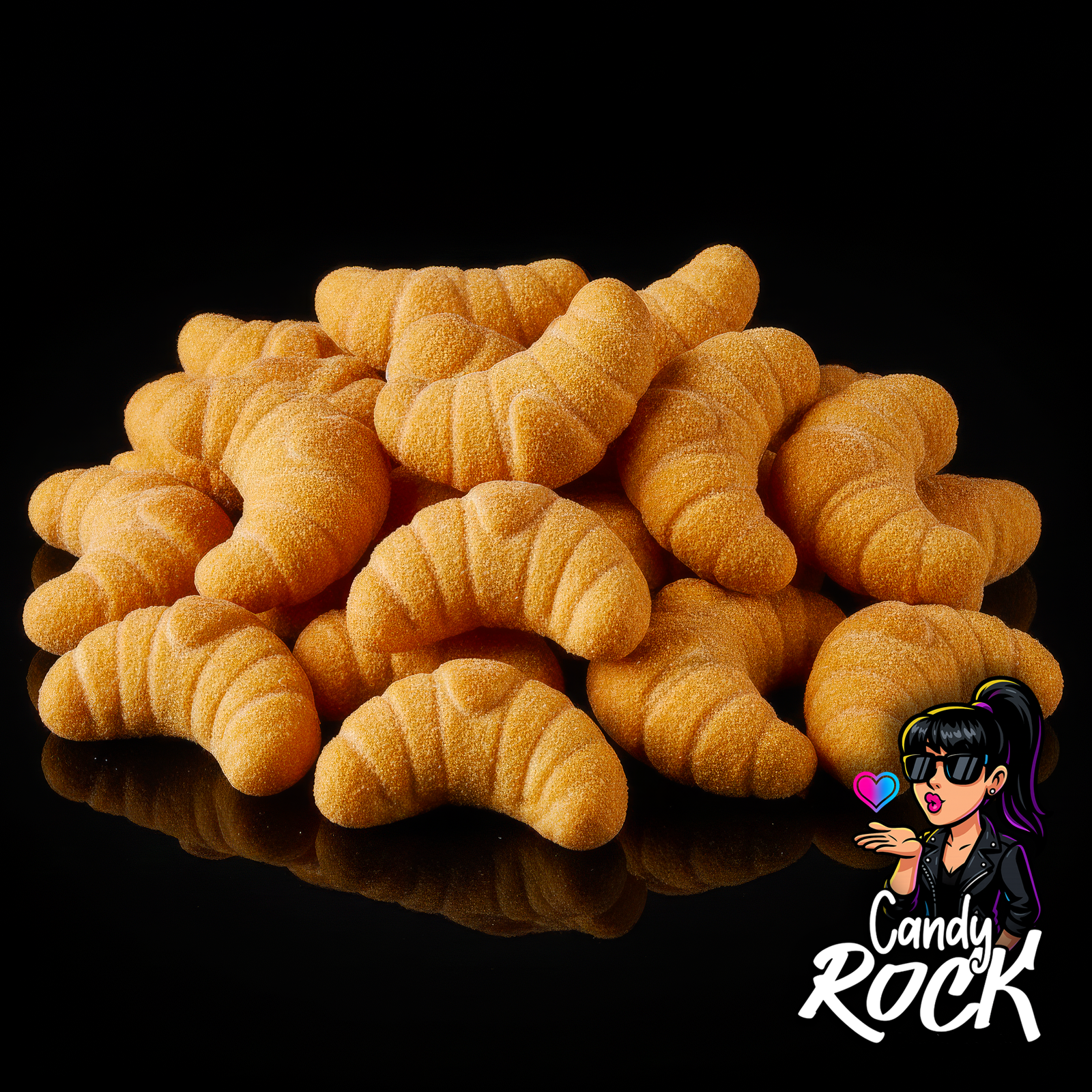 Zoom sur guimauves croissants beige montrant la texture moelleuse et le fourrage chocolat annoncé, CandyRock.