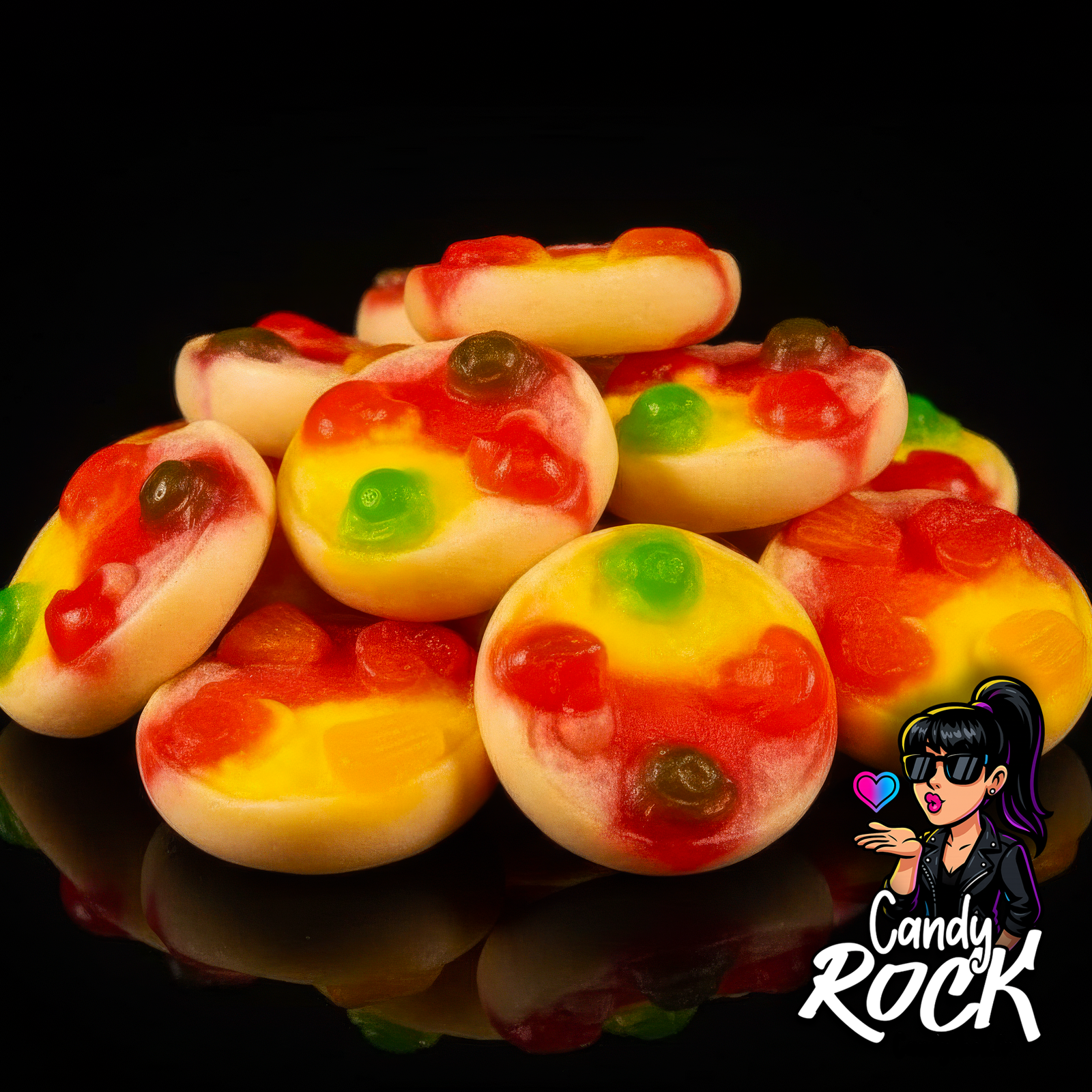 Zoom sur des mini pizzas gélifiées lisses et colorées, détail des textures fruitées CandyRock.