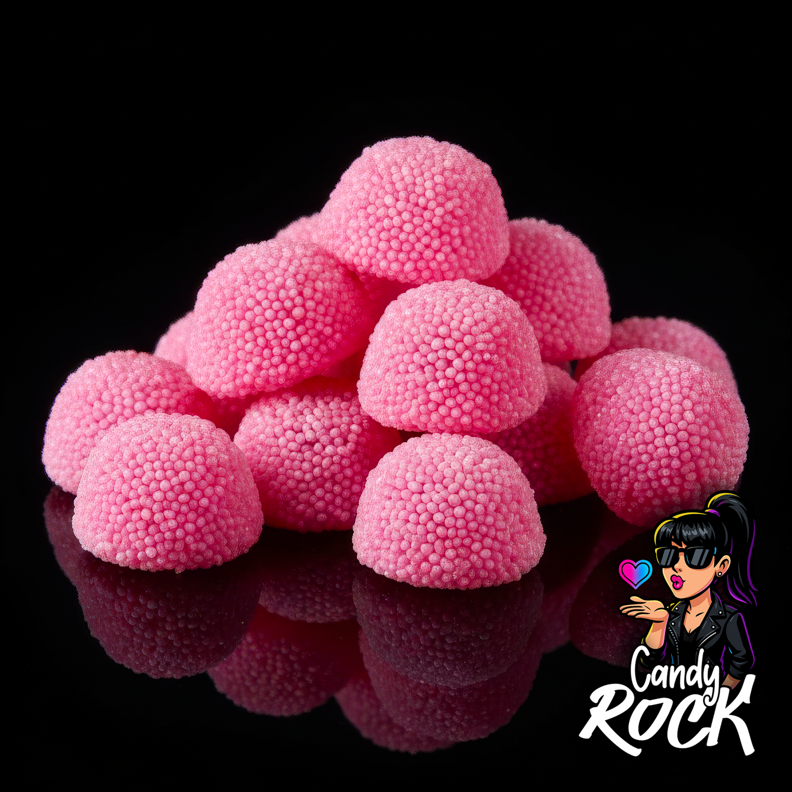 Zoom sur mûres roses gélifiées, détail des perles croquantes et de la texture tendre CandyRock.