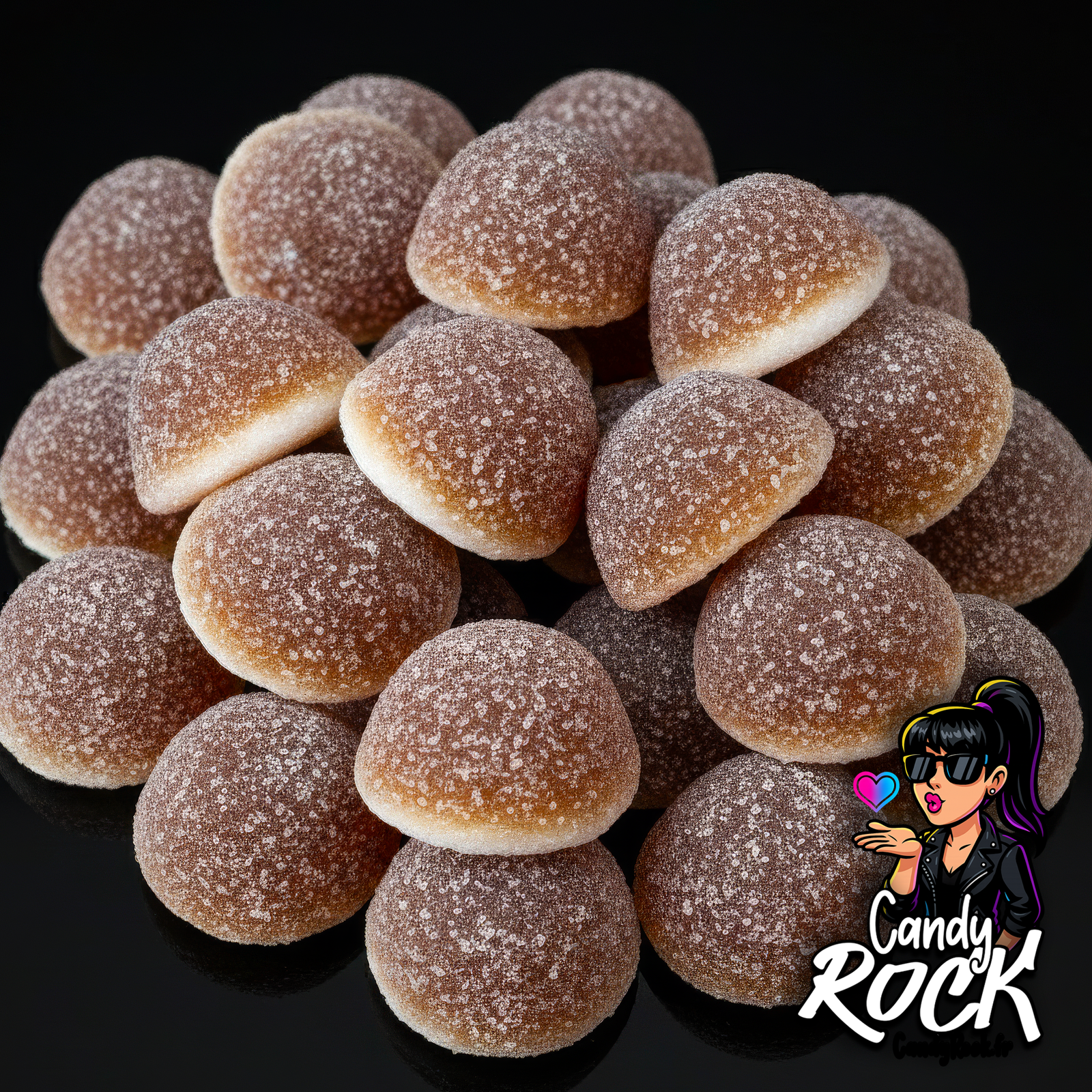 Bonbons sucrés en forme de demi-sphères coco brunes et blanches sur fond noir, présentation générale CandyRock.