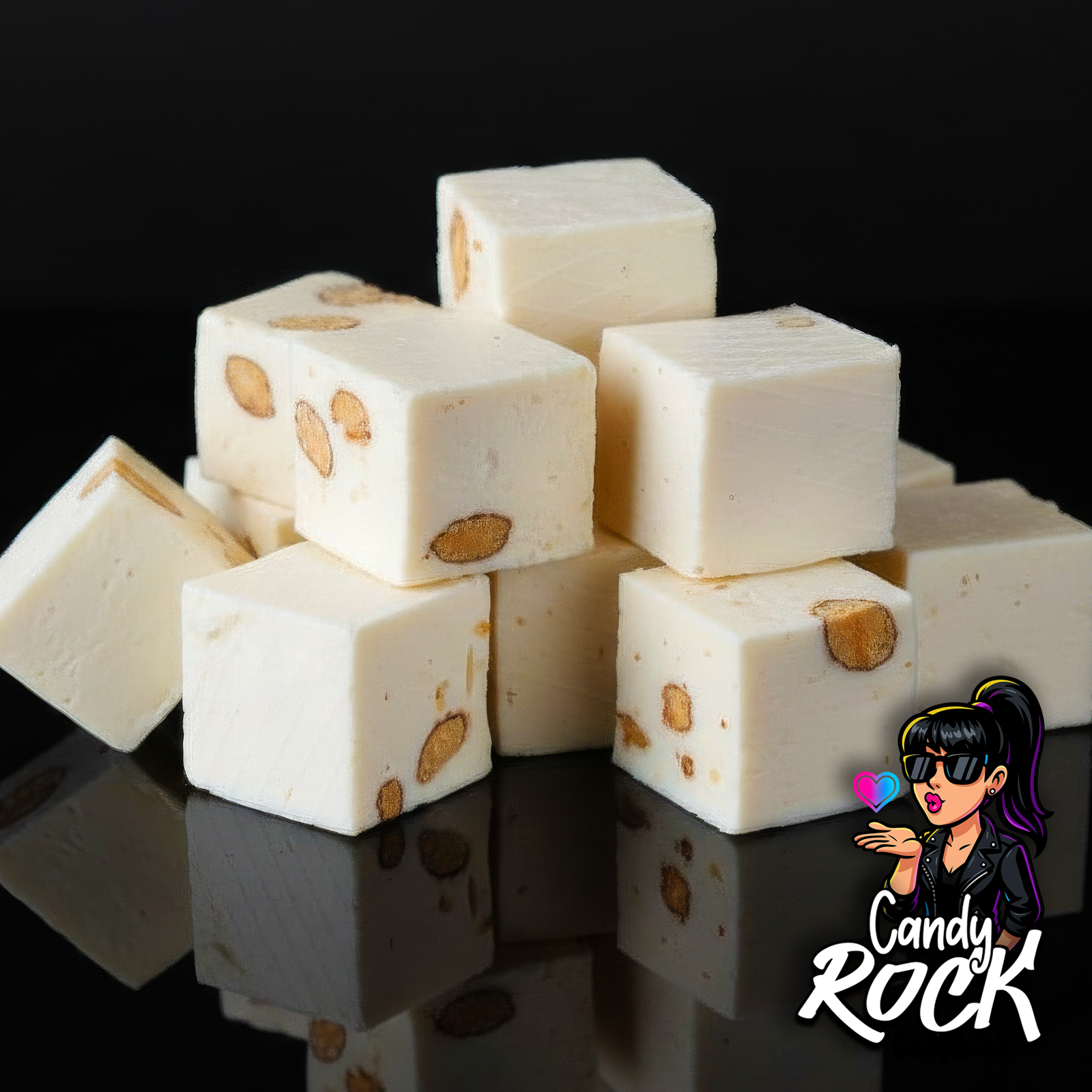 Gros plan sur nougats nature artisanaux de 3 cm, texture tendre et amandes entières visibles, emballés individuellement, CandyRock.