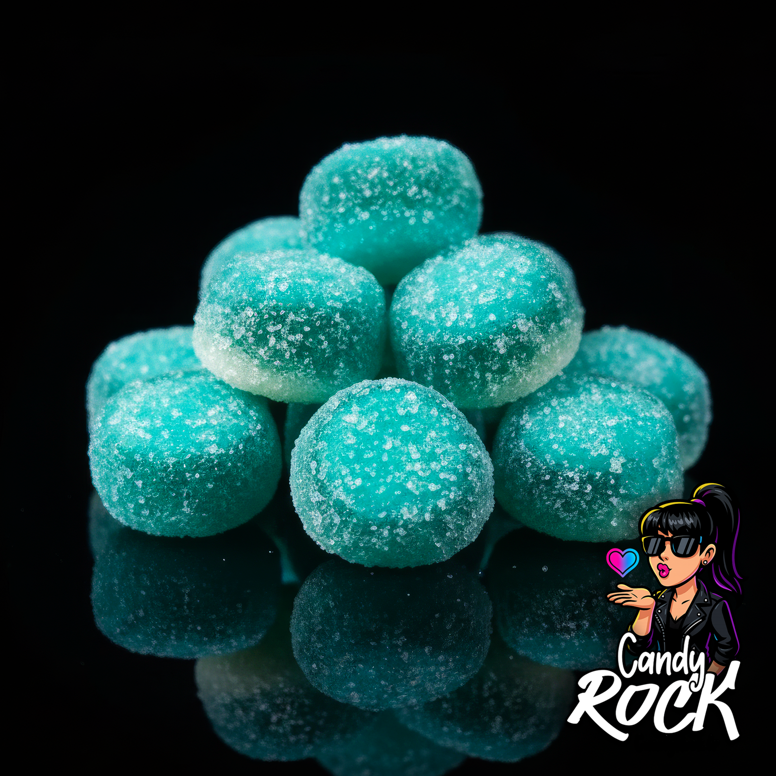 Zoom rapproché sur tartitas bleues gélifiées avec cœur blanc et enrobage sucré scintillant, CandyRock.