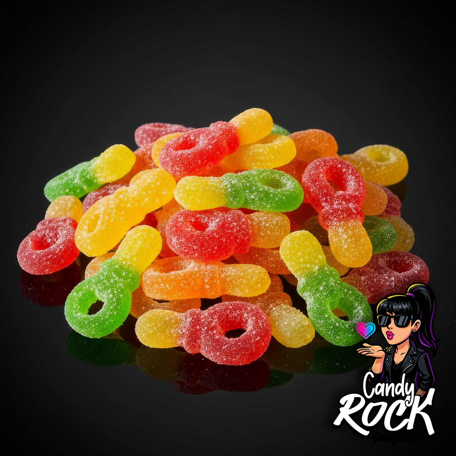 Vue rapprochée de tétines gélifiées multicolores CandyRock, détail du sucre acidulé et des textures moelleuses.